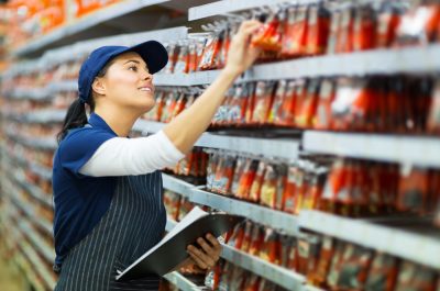 hardware store worker counting stock