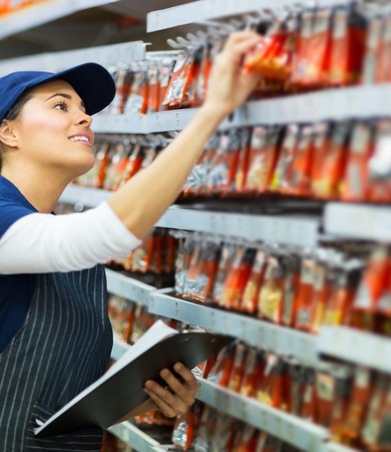 hardware store worker counting stock