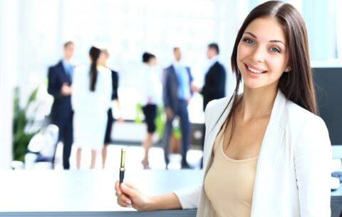 Young businesswoman and her colleagues